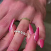 The Taryn Floating 7 Stone Diamond Wedding Ring in 14K yellow gold on model hand by Lisa Robin Jewelry
