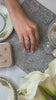 Briony diamond cut halo twist engagement ring with Quinn twist diamond cut wedding ring / Lisa Robin