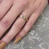 The Jordan narrow scatter Diamond wedding Ring in 14K yellow gold on model hand by Lisa Robin jewelry 