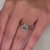 The Jaylin floral halo Diamond Engagement Ring with round cut diamond in yellow gold on model hand by Lisa Robin jewelry