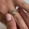 The Oakley Twist Princess Cut Diamond Engagement Ring by Lisa Robin Jewelry paired with the Marla chevron lab diamond 14K yellow gold wedding ring on model hand by Lisa Robin Jewelry