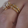 Ivy leaf and vine floral engagement ring with oval diamond paired with Beatrix engraved wedding ring by Lisa Robin
