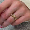 The leaf and vine Diamond wedding Ring in 14K yellow gold on model hand by Lisa Robin jewelry 