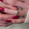 The Claire marquise curved open Diamond wedding Ring in 14K yellow gold on model hand by Lisa Robin jewelry 