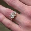 The lyric toi et moi Diamond Engagement Ring with emerald cut diamond in yellow gold on model hand by Lisa Robin jewelry