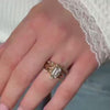 The Gabriella Octagon Engagement Ring with emerald cut diamond in yellow gold on model hand by Lisa Robin Jewelry
