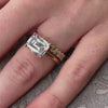 The Mia east west emerald cut Diamond Engagement Ring in yellow gold paired with Blaine Baguette diamond eternity ring in 14K yellow gold on model hand by Lisa Robin jewelry