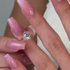 The Jaylin floral halo Diamond Engagement Ring with round cut diamond in yellow gold on model hand by Lisa Robin jewelry