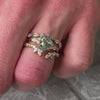 The Finley marquise diamond 14K yellow gold wedding ring on model hand by Lisa Robin Jewelry