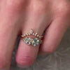The Chloe cluster Diamond Engagement Ring with round cut diamond in yellow gold on model hand by Lisa Robin Jewelry 