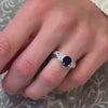 The Anna Sapphire Diamond Engagement Ring with pear cut diamond in white gold on model hand by Lisa Robin Jewelry