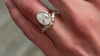 The Emery bezel diamond engagement ring and the Kendall curved diamond wedding ring on model | Lisa Robin