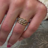 The Dominic Baguette Diamond Wedding Ring in 14k yellow gold on model hand by Lisa Robin jewelry