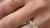 The Sierra halo engagement ring paired with the Channing and Tara wedding rings on model | Lisa Robin