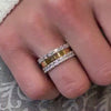 Avery east west emerald cut lab grown eternity 14K yellow gold wedding band on model hand by Lisa Robin Jewelry 
