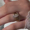 The Quinn Twist Diamond Wedding Ring in 14k yellow gold on model hand by Lisa Robin jewelry