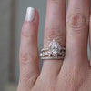 The Tara Marquise Diamond Wedding Ring in 14k yellow gold on model hand by Lisa Robin jewelry