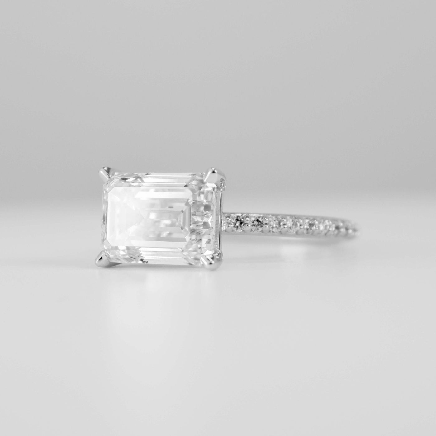 Shown in 4.0 carat * The Adelaide Emerald Cut Diamond East West Pavé Ring | Lisa Robin#color_18k-white-gold