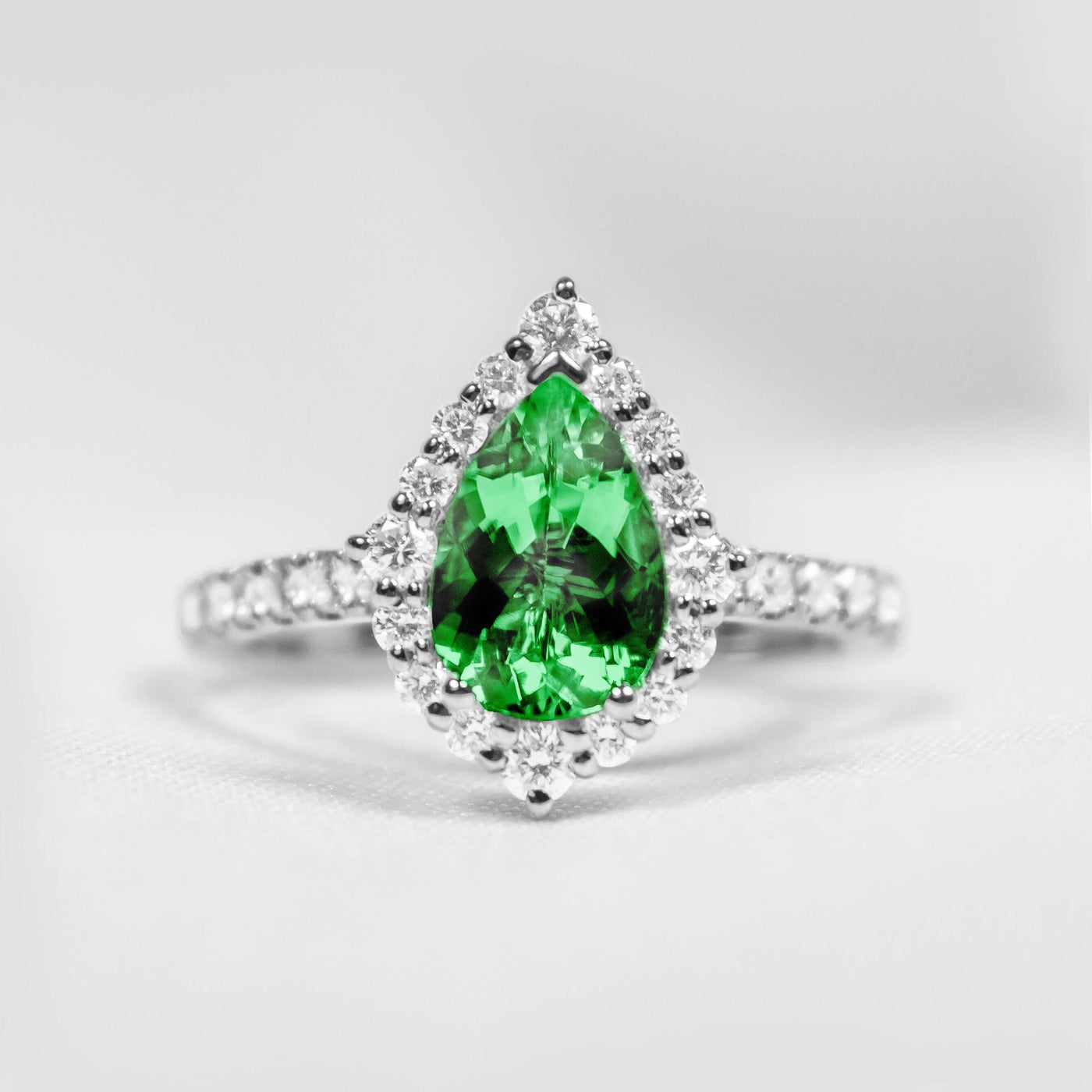 The Sierra Pear Emerald Halo Engagement Ring